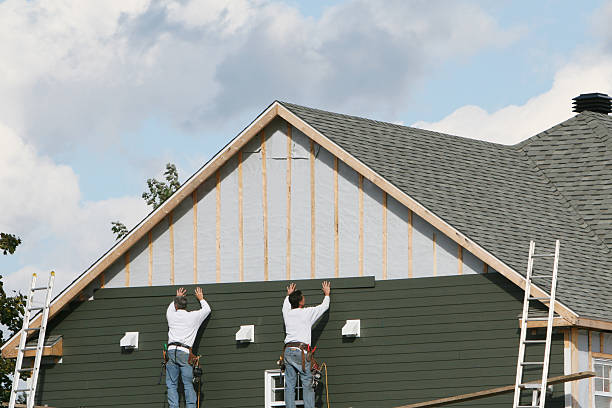 Professional Emergency Siding Repair technician working in Cowansville, PA